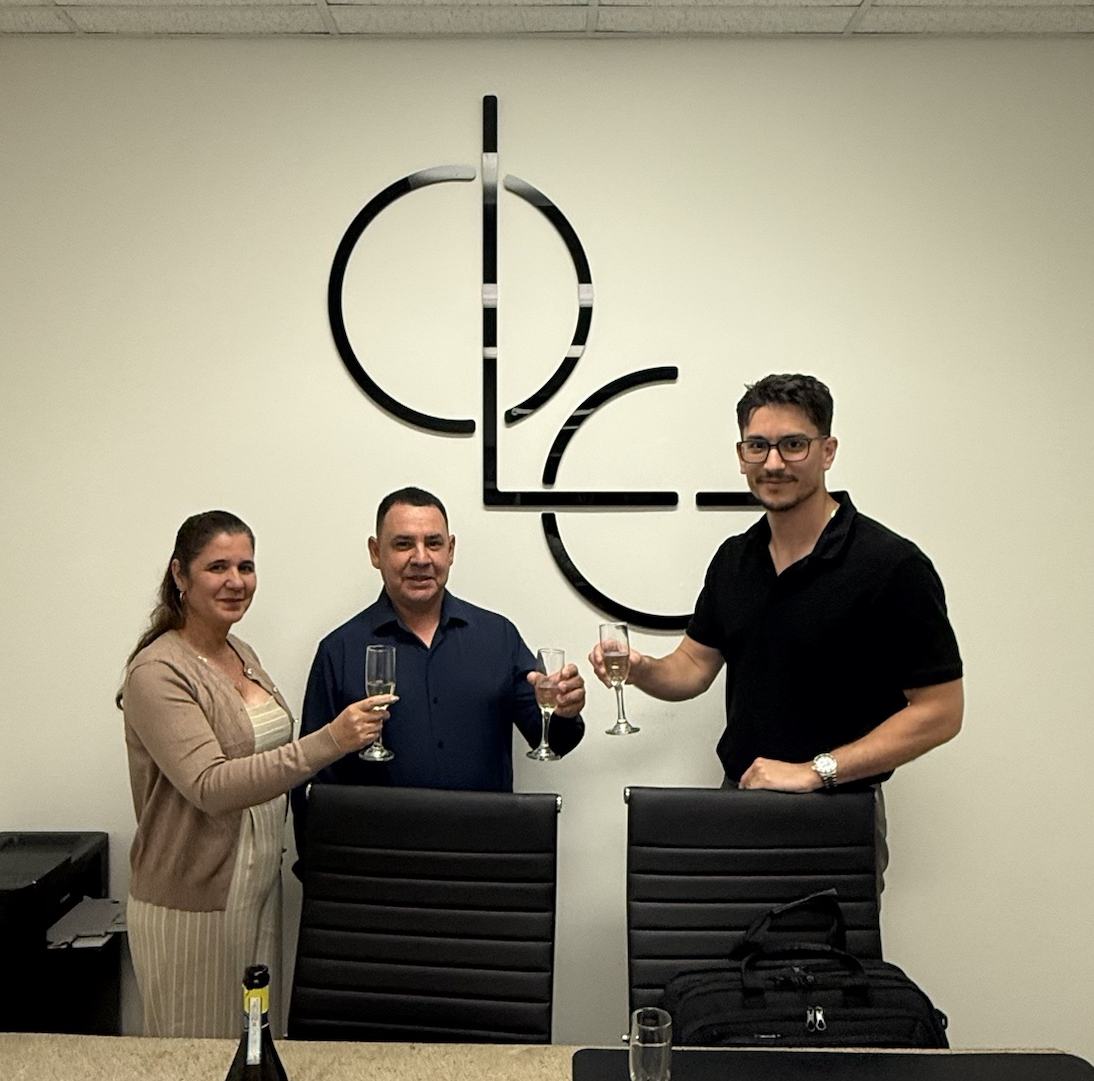 Clients toasting with Marco on closing day