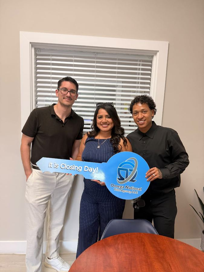 Marco with clients on closing day